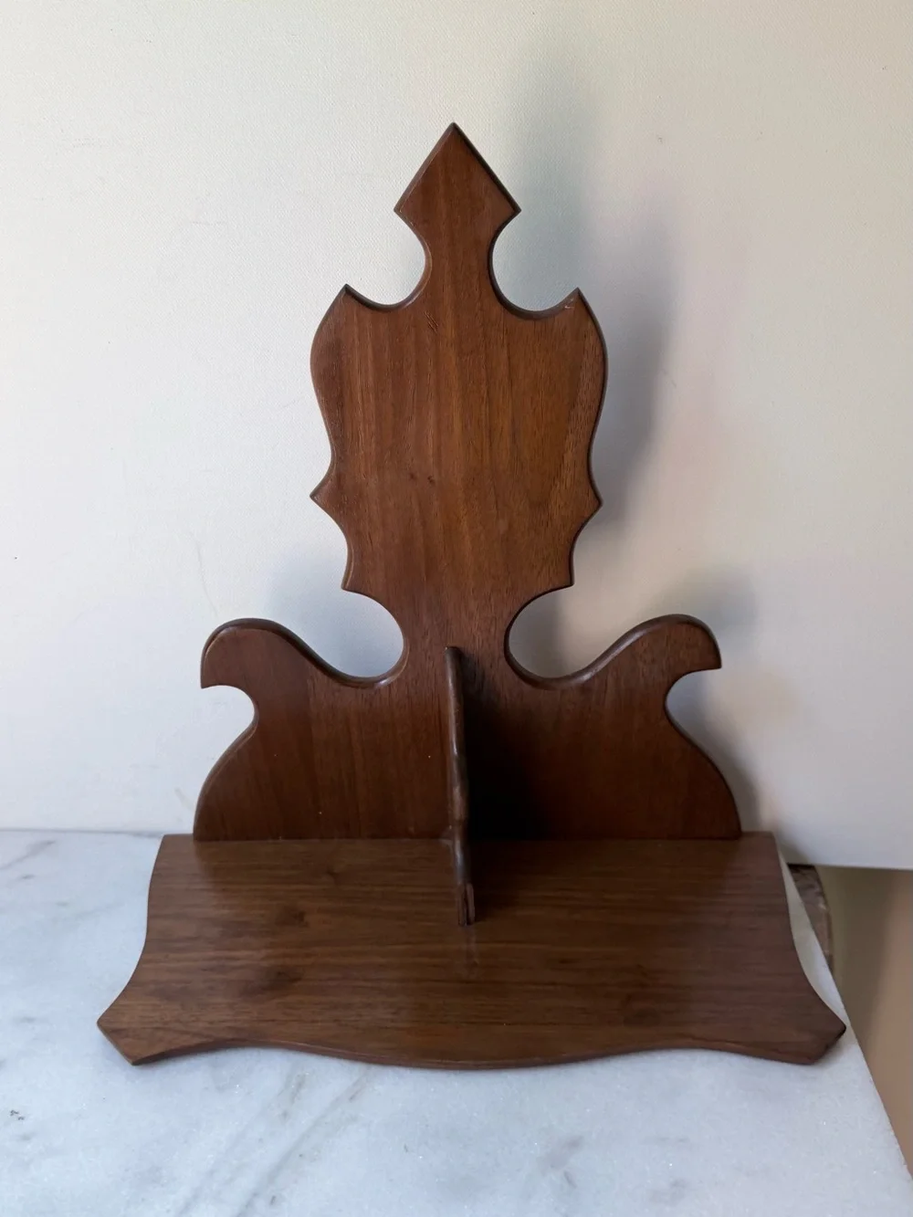 vintage wall sconce shelf made of carved wood with a dark finish